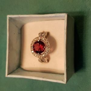 925 Sterling Silver ring with Lab created garnet and white topaz.